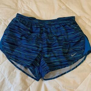 NIKE, running shorts, built in liner, draw cord and vent side, great condition